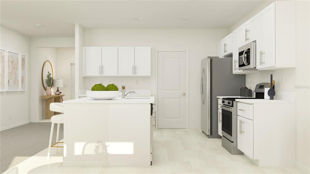 This is a rendering of a modern kitchen featuring white cabinets, stainless appliances, and an island — 11918 VIOLET MOONSTONE DRIVE, PARRISH, FL
