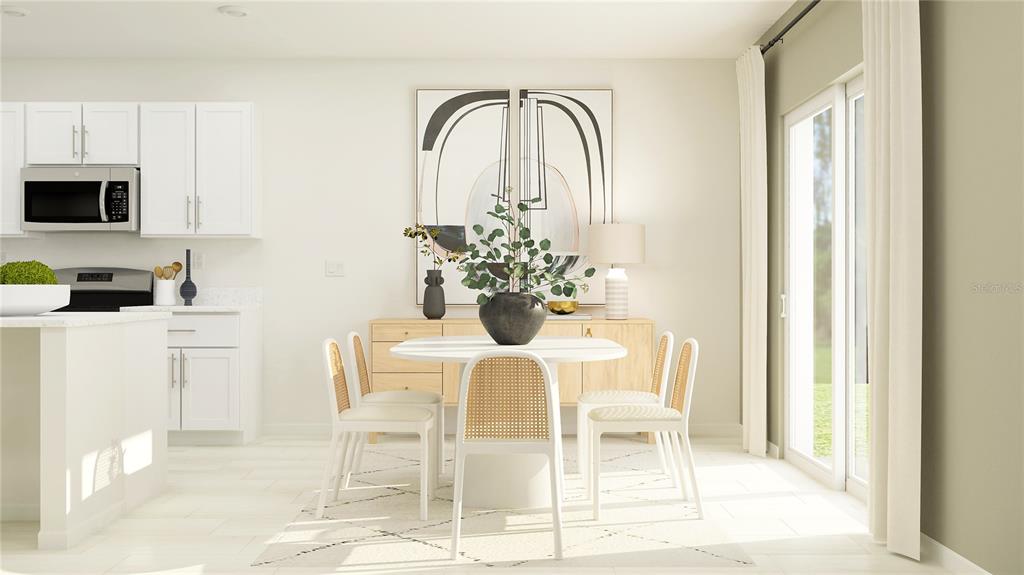 This is a digital rendering of a dining area with white cabinets and cane chairs — 11918 VIOLET MOONSTONE DRIVE, PARRISH, FL