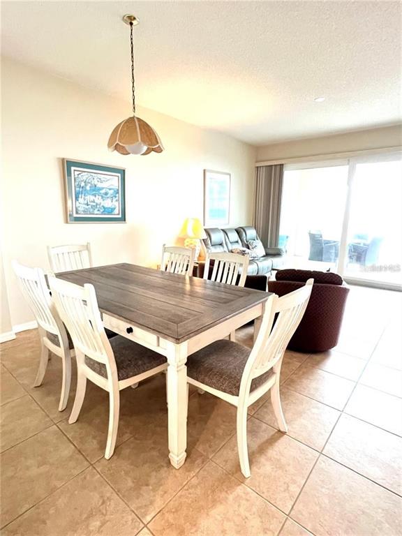 A view of the ocean and beach at sunrise with a colorful, cloudy sky — 104 SURFVIEW DRIVE UNIT 2503, PALM COAST, FL