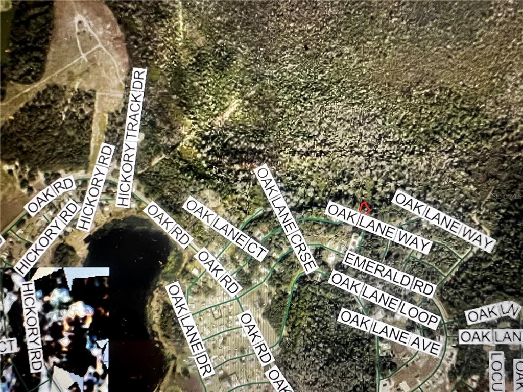 This is an aerial map showing residential streets and a lake — 12 OAK LANE WAY, OCALA, FL