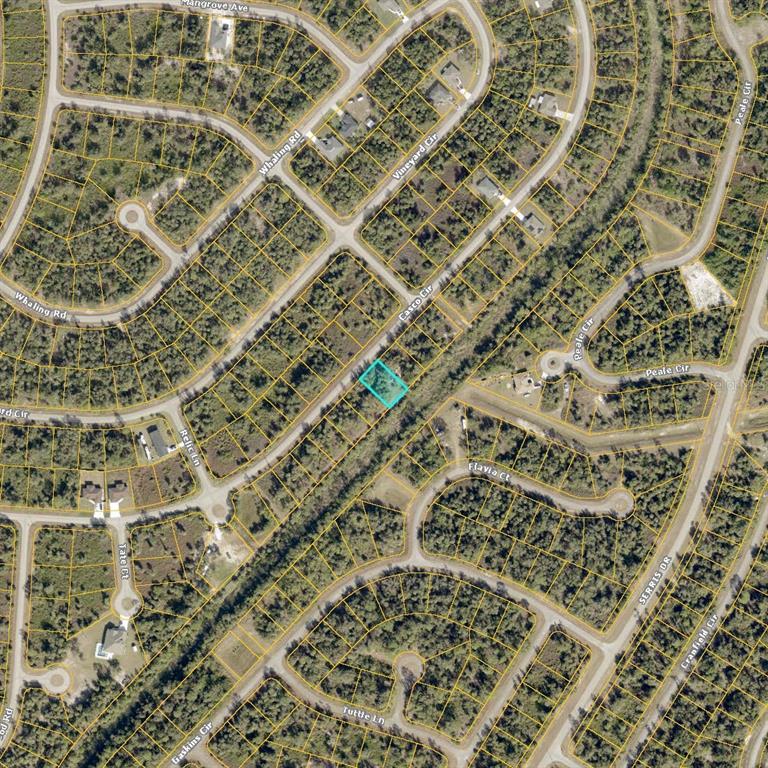 This is an aerial map view of a vacant residential lot highlighted in blue — Lot 31 CASCO CIRCLE, NORTH PORT, FL