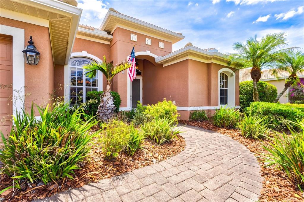This is a floor plan of a house featuring four bedrooms, a garage, and a pool — 315 PETREL TRAIL, BRADENTON, FL