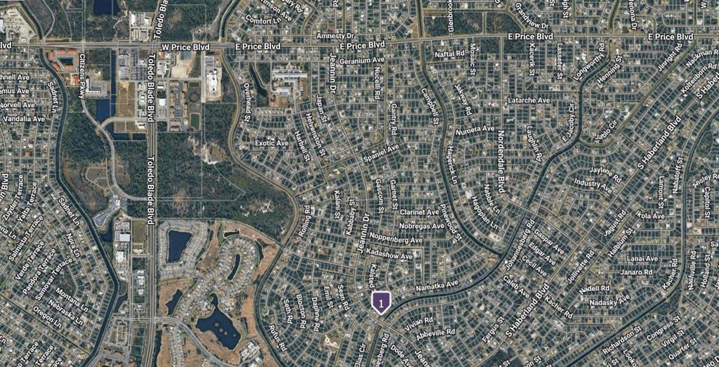 This is an aerial map view of a residential neighborhood with many streets — Lot#26 JEANNIN DRIVE, NORTH PORT, FL