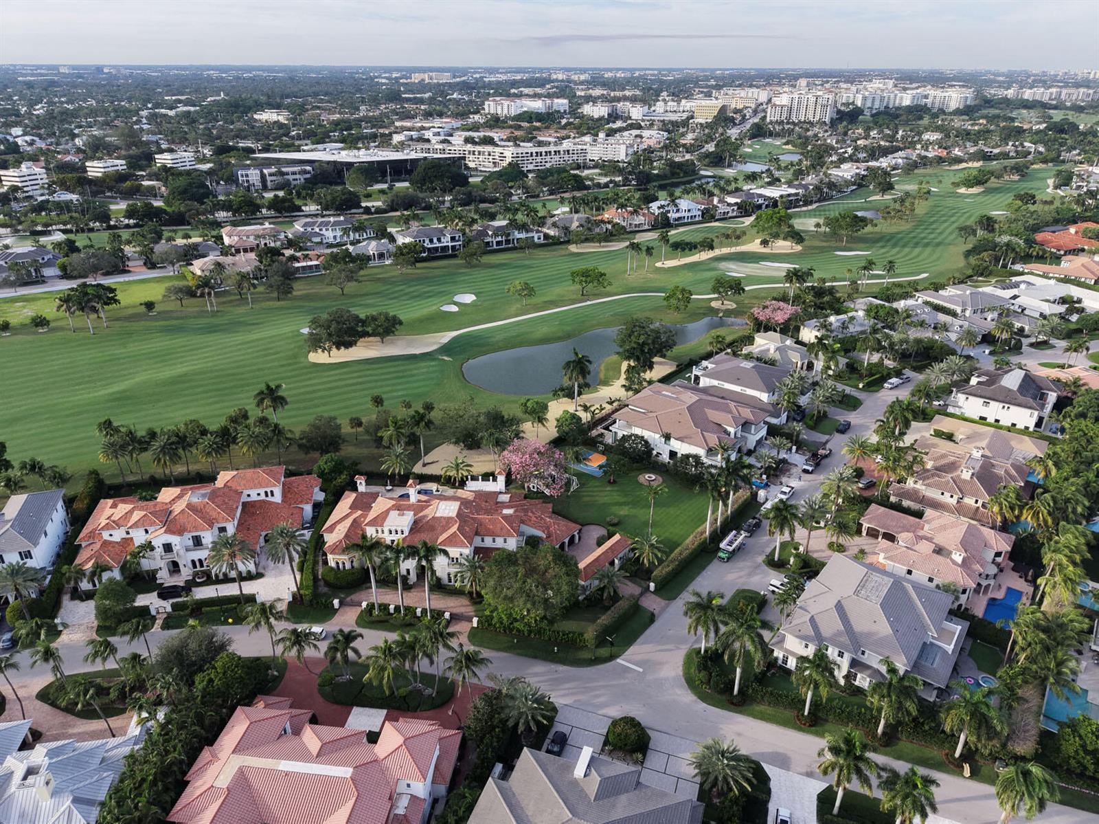 An aerial view of a residential neighborhood featuring large houses bordering a golf course — 1869 Sabal Palm Drive, Boca Raton FL 33432, BOCA RATON, FL