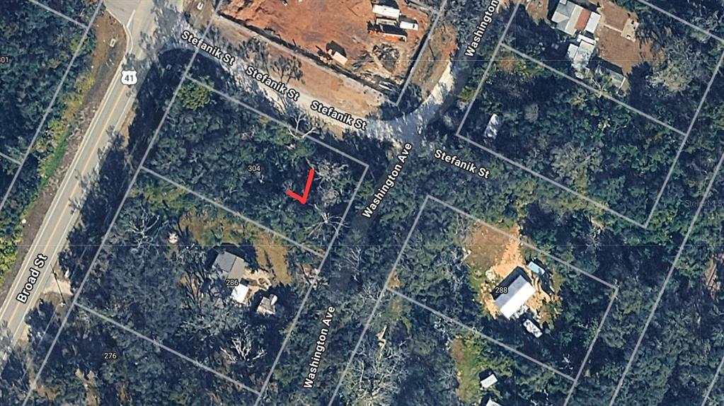 This is an aerial map view of a vacant lot located at a street intersection — BROAD STREET, BROOKSVILLE, FL