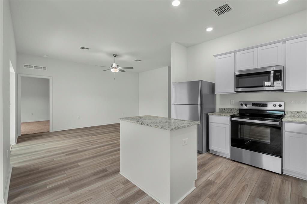 13343 TULA LOOP, ASTATULA, FL — photo 4 of 19