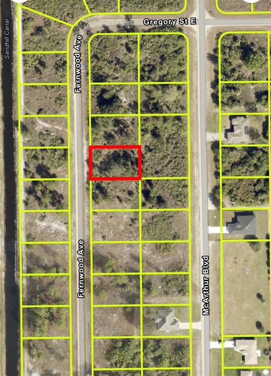 This is an aerial map showing a vacant lot highlighted in red within a residential neighborhood — 413 & 415 FERNWOOD AVENUE S, LEHIGH ACRES, FL