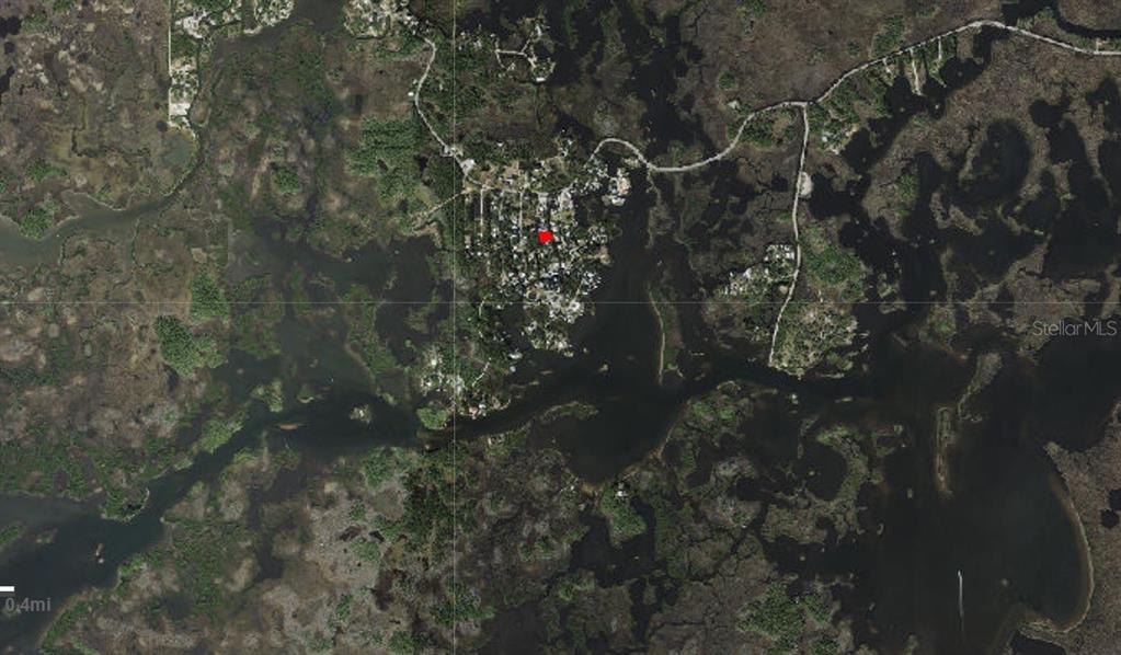 An aerial map shows a residential neighborhood surrounded by wetlands and waterways — 2211 S HUNT POINT, CRYSTAL RIVER, FL