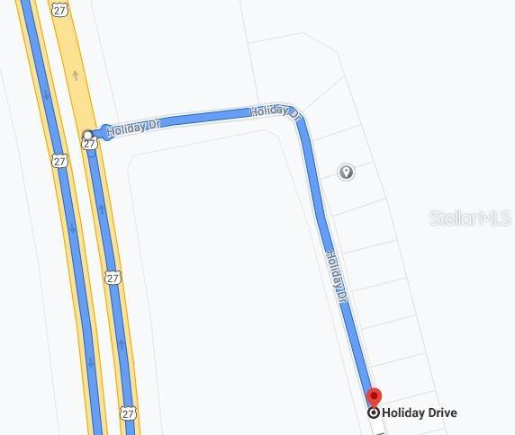 This map shows a route from Highway 27 onto Holiday Drive to a specific location — 132 COLLINWOOD DRIVE, LAKE PLACID, FL