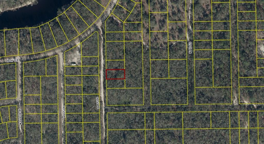 This is an aerial map showing a rectangular parcel of land highlighted in red — 04-01S-12E-09475-180060 181ST ROAD, LIVE OAK, FL
