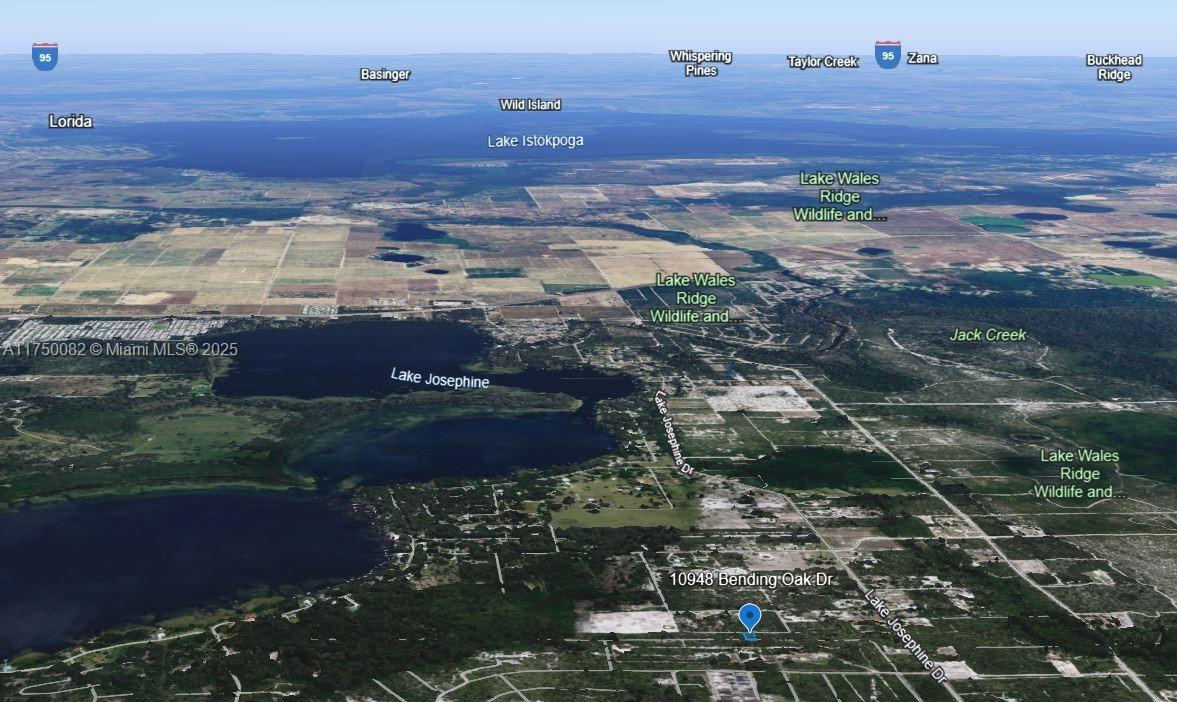 An aerial map view shows Lake Josephine and surrounding rural landscape in Florida — 10948 Bending Oak Drive, Sebring FL 33875, SEBRING, FL