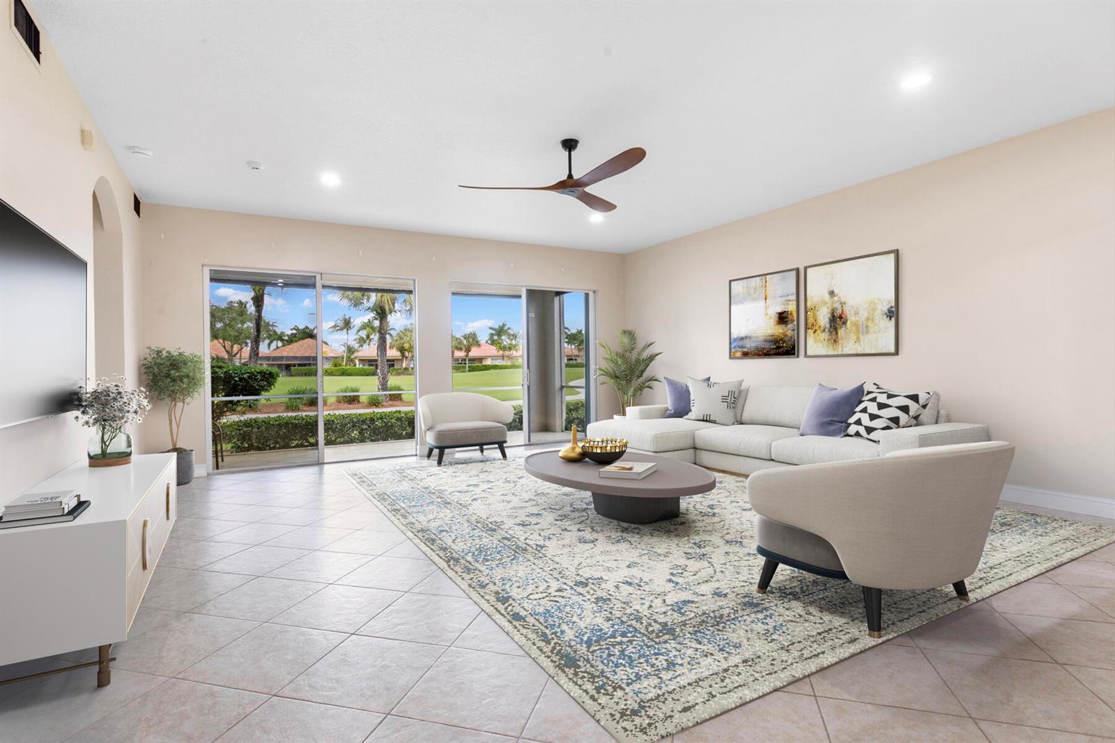 A dining room features a marble-topped table, upholstered chairs, a chandelier, and wall art — 10263 Orchid Reserve Drive # 21b, FL 33412, FL