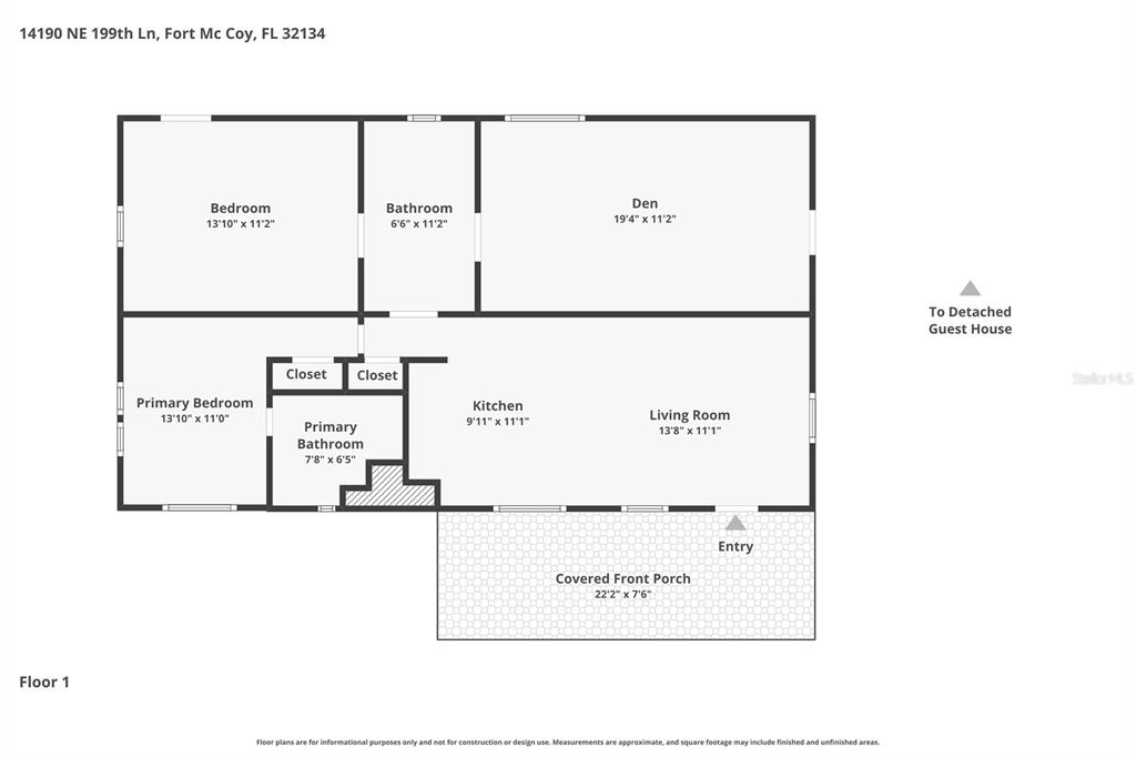 A two-story house with a large teal deck, an above-ground pool, and a detached garage — 14190 NE 199TH LANE, FORT MC COY, FL