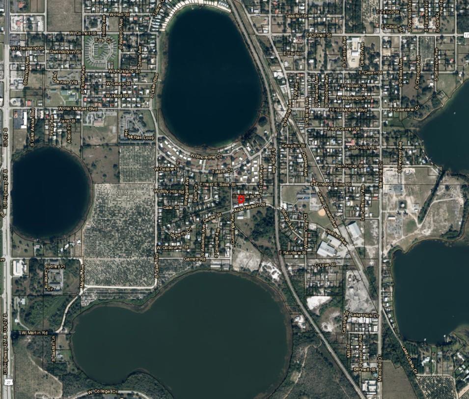 This is an aerial map view of a residential neighborhood surrounding several lakes — 30 E Metcalfe Street, FL 33825, FL