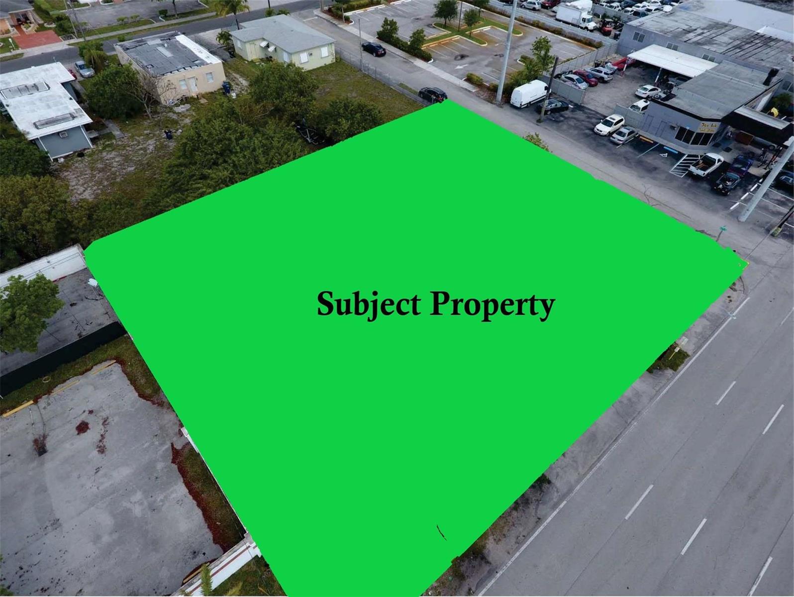 An aerial view shows a green-highlighted lot located at a street corner — 617 N Dixie Highway, Hallandale Beach FL 33009, HALLANDALE BEACH, FL