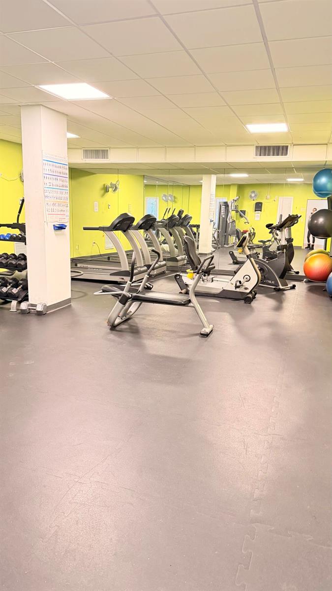 This gym features treadmills, stationary bikes, free weights, and a mirrored wall — 3450 S Ocean Boulevard # 224, Palm Beach FL 33480, PALM BEACH, FL