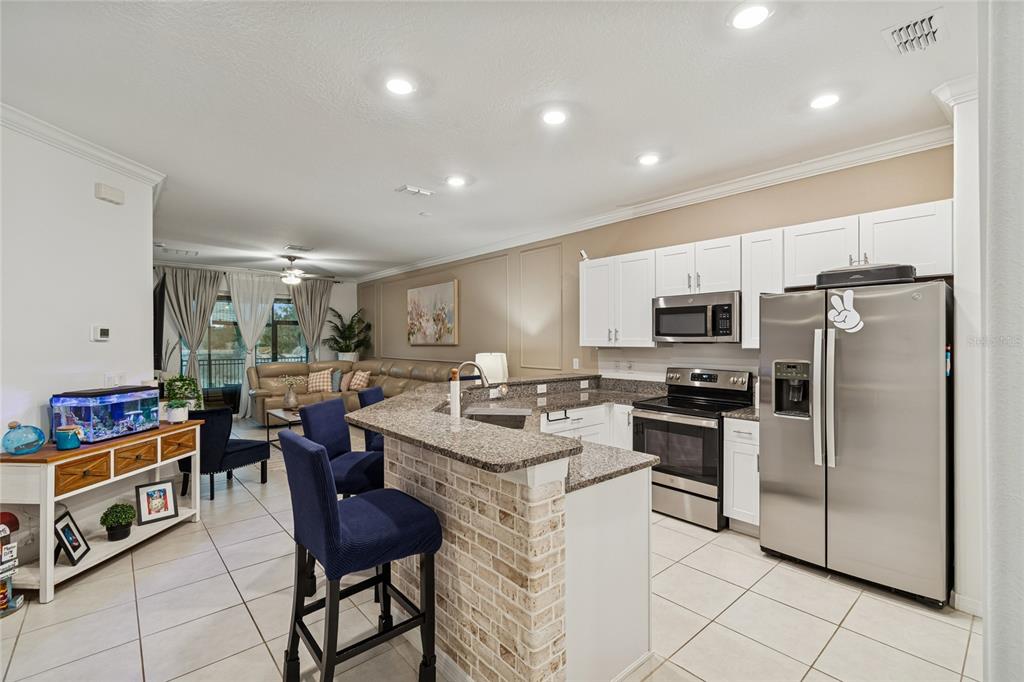 6773 RIPPLE POND LOOP, ZEPHYRHILLS, FL — photo 5 of 30