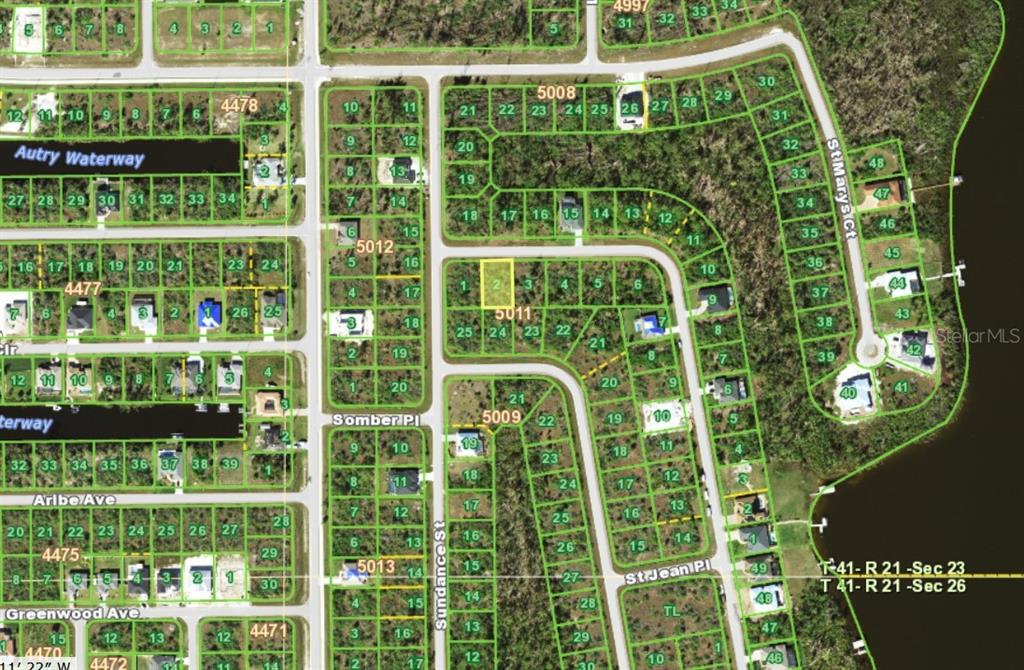 This is a satellite map showing residential lots and streets in a suburban neighborhood — 9477 SHELBURNE CIRCLE, PORT CHARLOTTE, FL
