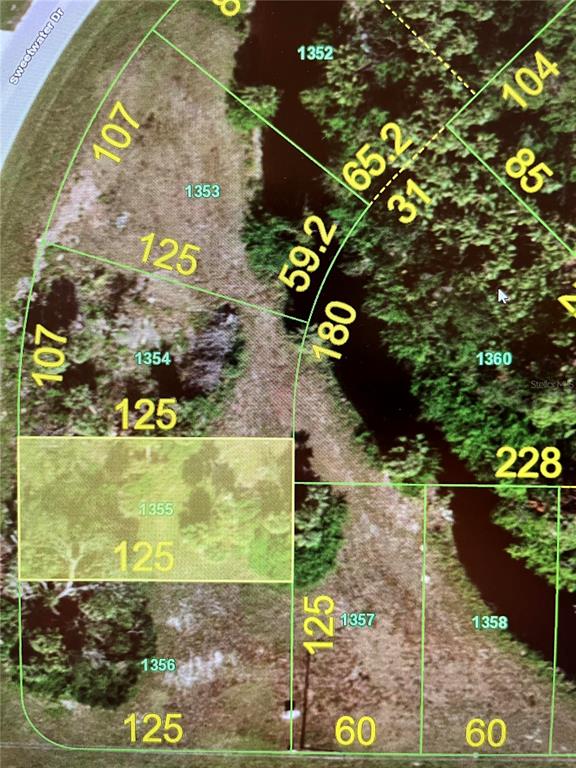 This is a map showing property lot lines and dimensions for a residential subdivision — 303 SWEETWATER DRIVE, ROTONDA WEST, FL