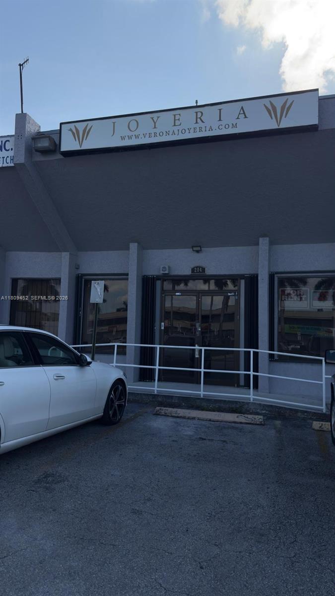 The exterior of a commercial building features a storefront sign for a jewelry store — 3960 W 16th Ave # 204, Hialeah FL 33012, HIALEAH, FL