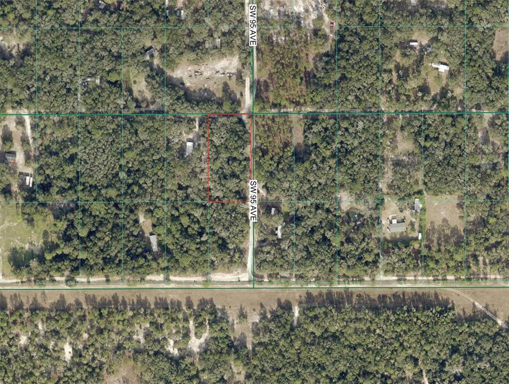This is an aerial map showing a rectangular plot of land outlined in red — SW 158TH LANE, DUNNELLON, FL