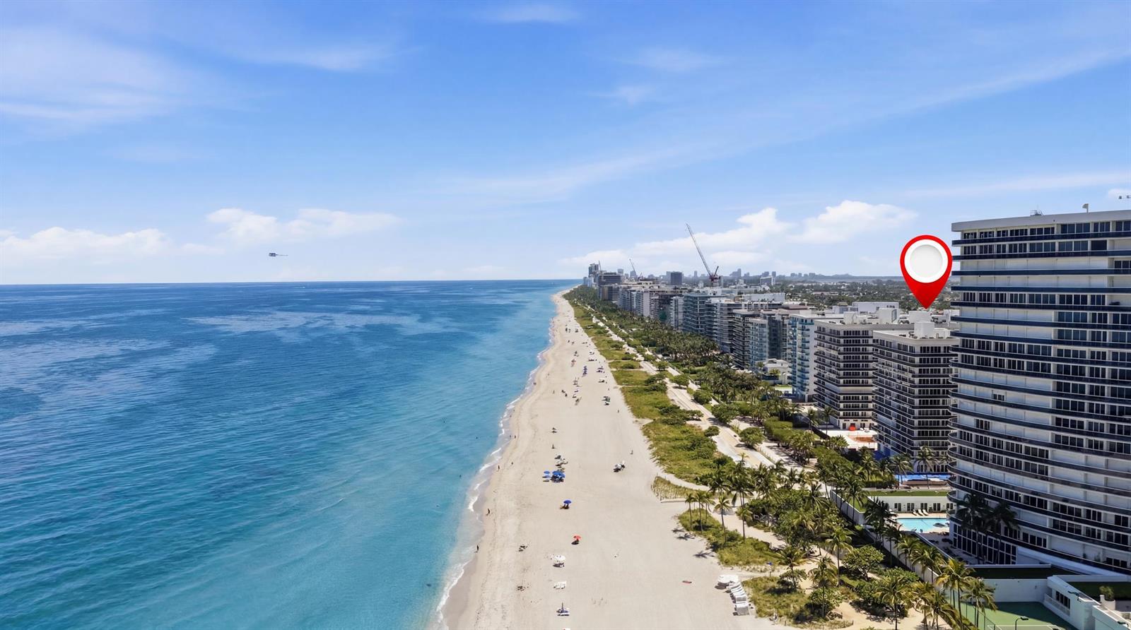 An aerial view of a beachside high-rise building with a red location pin — 9595 Collins Avenue, Surfside FL 33154, SURFSIDE, FL