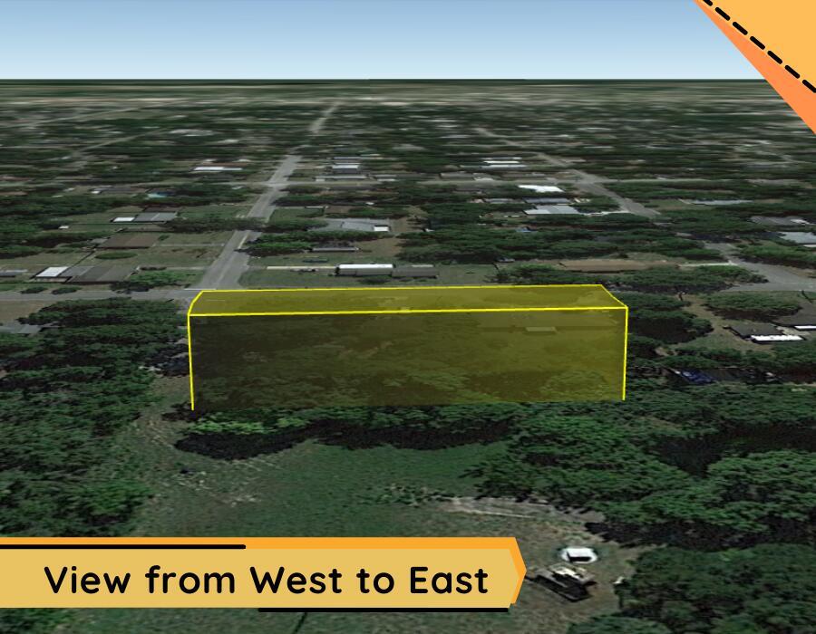 An aerial rendering shows a rectangular yellow highlighted area over a wooded residential lot — 0 W University Avenue, Deland FL 32720, DELAND, FL