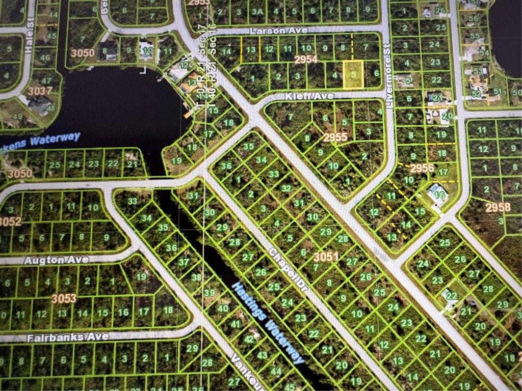 This is a map showing residential land parcels and street layouts in a neighborhood — 14060 KLEFF AVENUE, PORT CHARLOTTE, FL