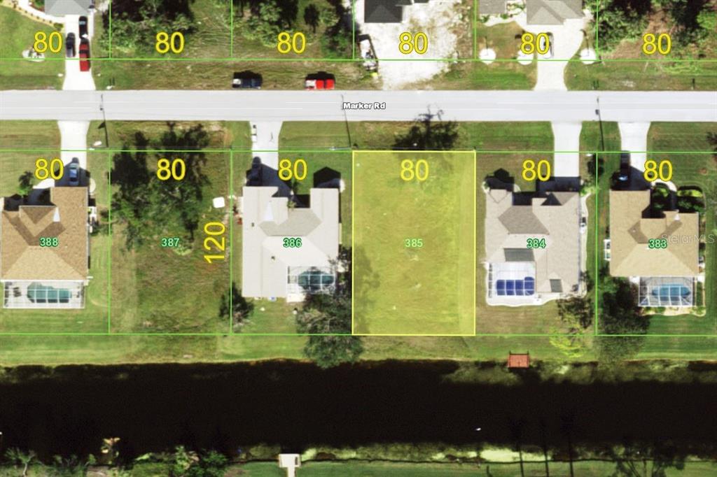 This is an aerial map showing a vacant residential lot highlighted in yellow — 223 MARKER ROAD, ROTONDA WEST, FL