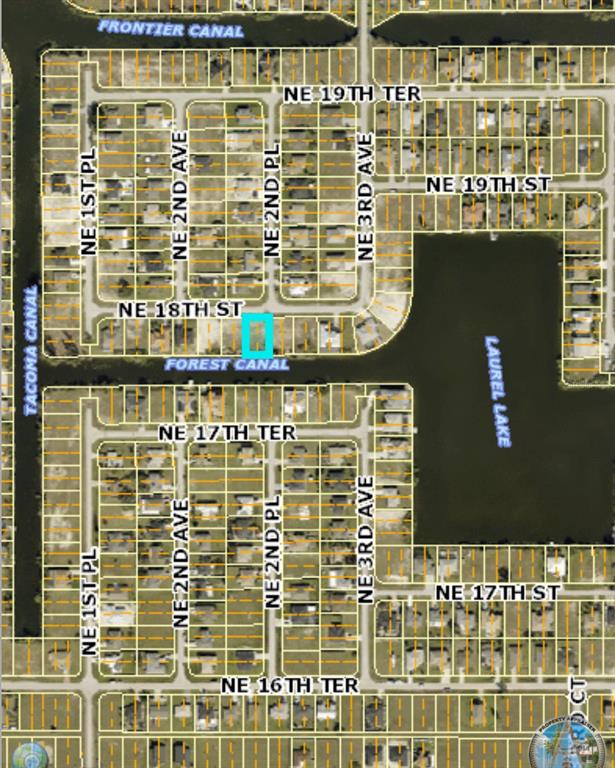 This is a property map showing a highlighted residential lot along a canal — 212 NE 18TH STREET, CAPE CORAL, FL