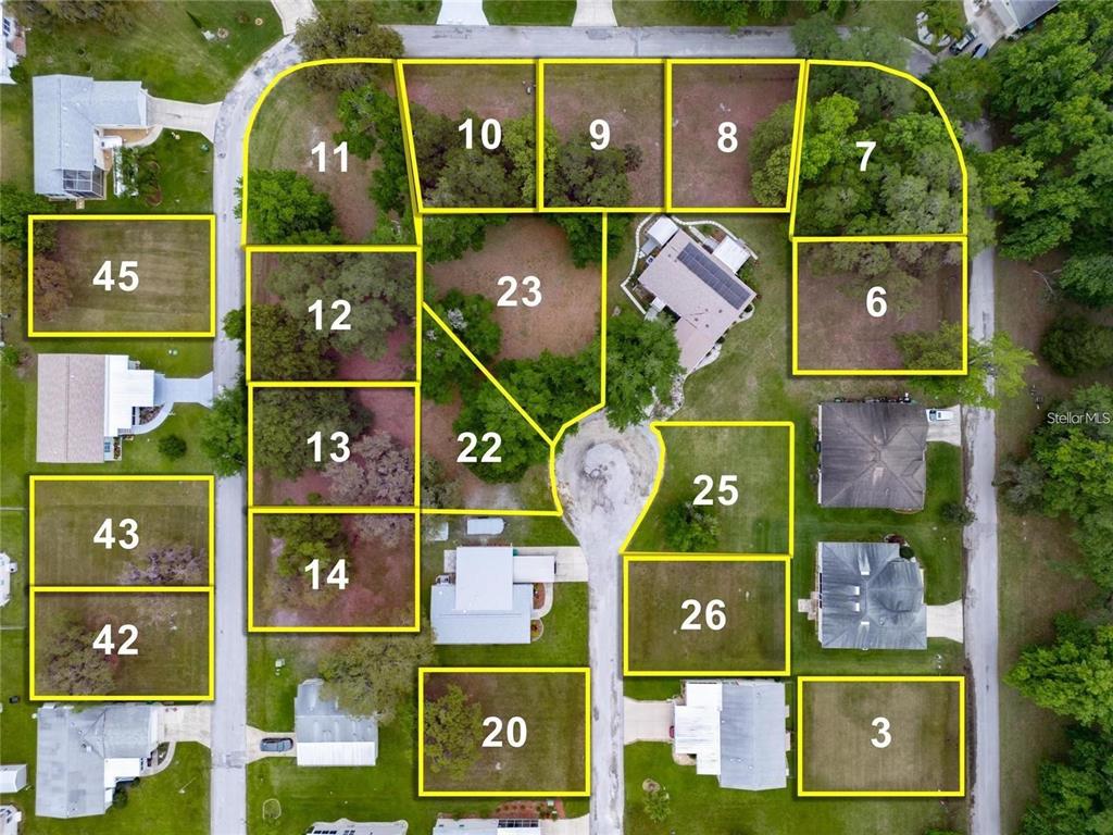 This is an aerial map showing numbered residential lots and existing houses — LOT 6 BLK D LEXINGTON CIRCLE, WILDWOOD, FL