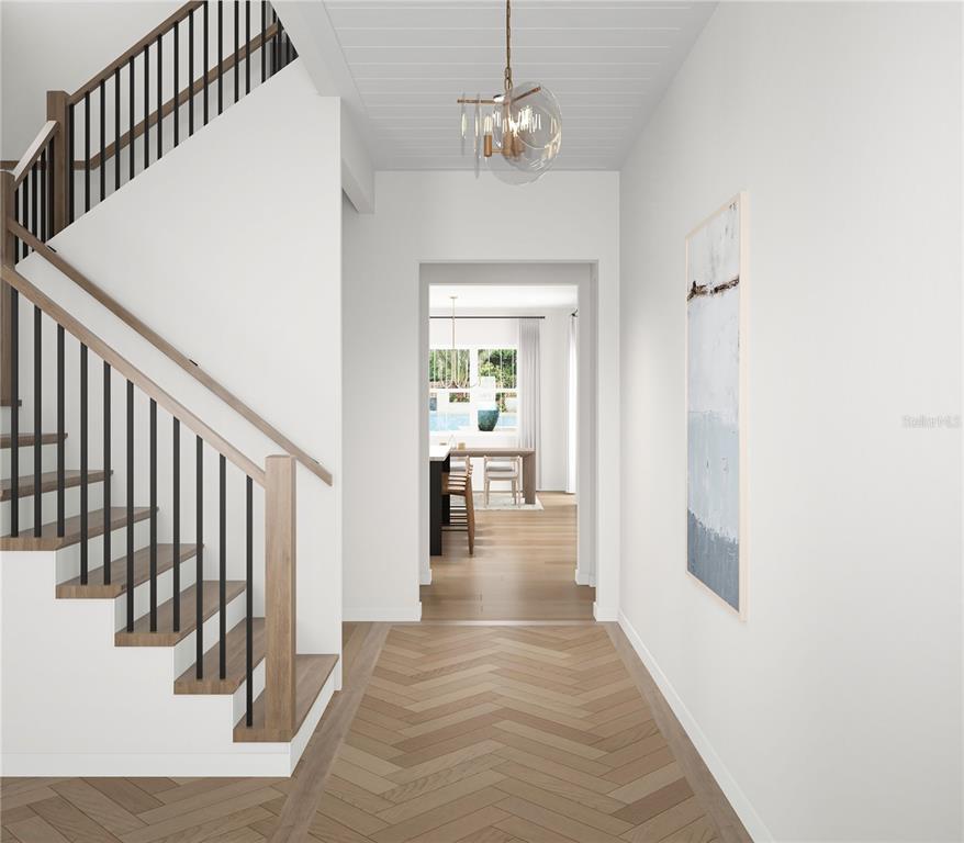 This is a rendering of a foyer with a staircase and herringbone wood flooring — 1042 S STERLING AVENUE, TAMPA, FL