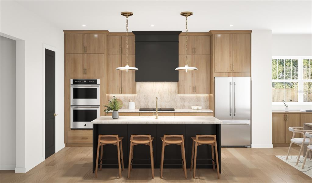 This is a rendering of a modern kitchen featuring wood cabinetry, a black island, and appliances — 1042 S STERLING AVENUE, TAMPA, FL