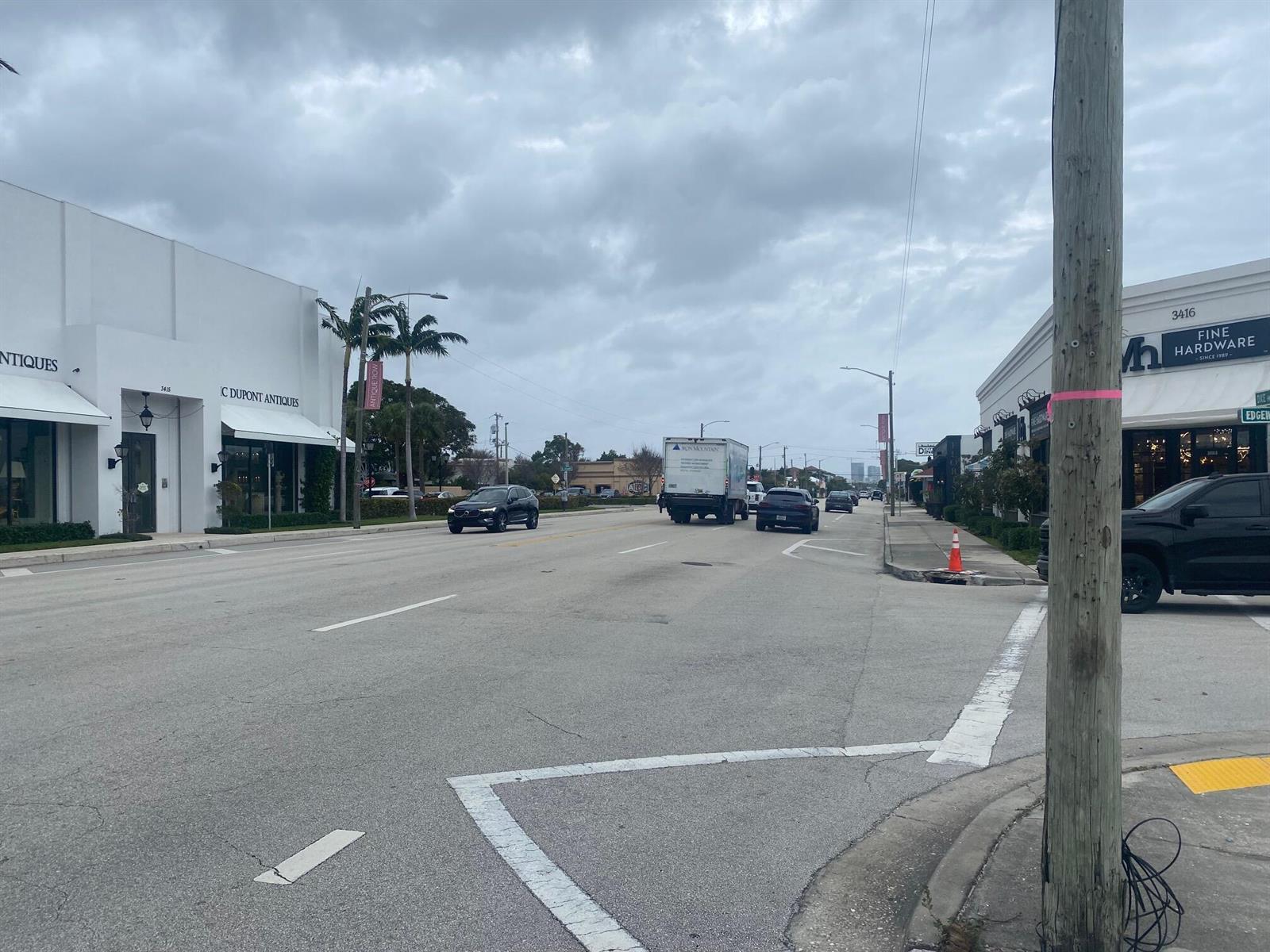 A street view shows a multi-lane road lined with commercial buildings, palm trees, and vehicles — 3500 S Dixie Highway, West Palm Beach FL 33405, WEST PALM BEACH, FL