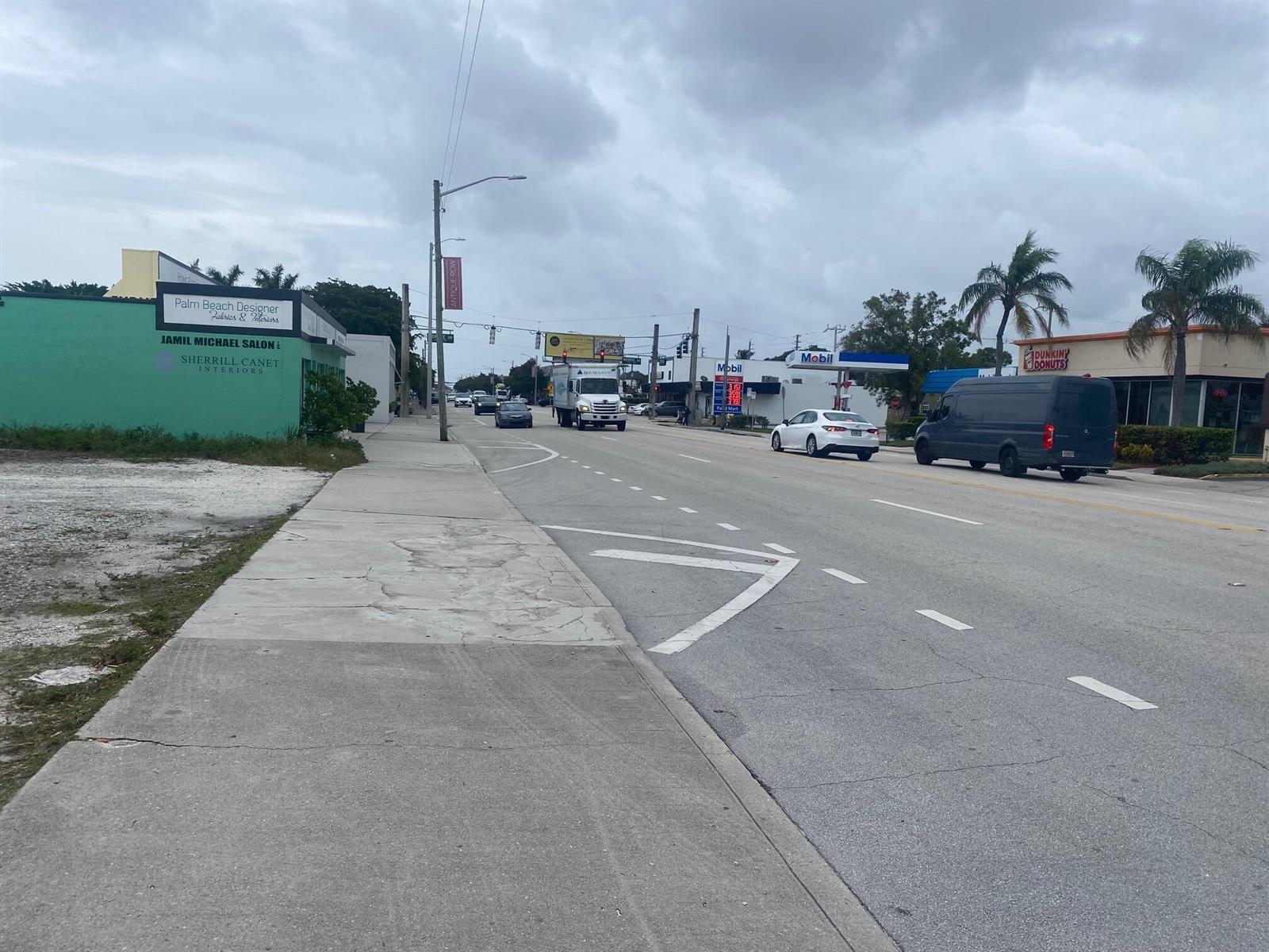 A street view showing a road with a Mobil gas station and a Dunkin' Donuts — 3500 S Dixie Highway, West Palm Beach FL 33405, WEST PALM BEACH, FL