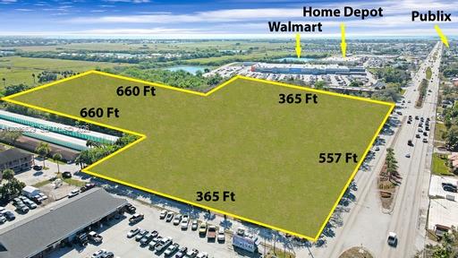 An aerial map shows a vacant, irregularly shaped plot of land outlined in yellow — 1905 S. PARROTT AVE., Okeechobee FL 34974, OKEECHOBEE, FL