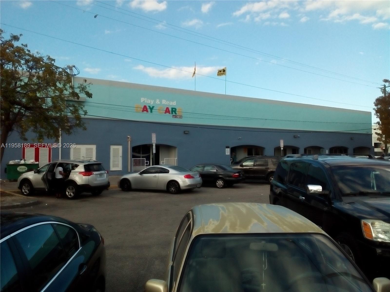 The exterior of a daycare center building with a parking lot in the foreground — 1726 NW 36th St # 2, Miami FL 33142, MIAMI, FL