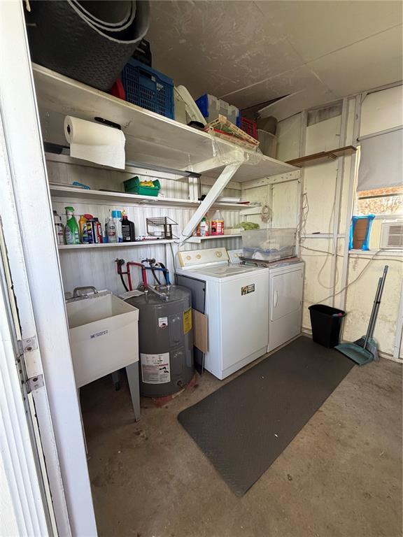 A utility room features a water heater, laundry appliances, a utility sink, and open shelving — 520 MARNIE CIRCLE, MELBOURNE, FL
