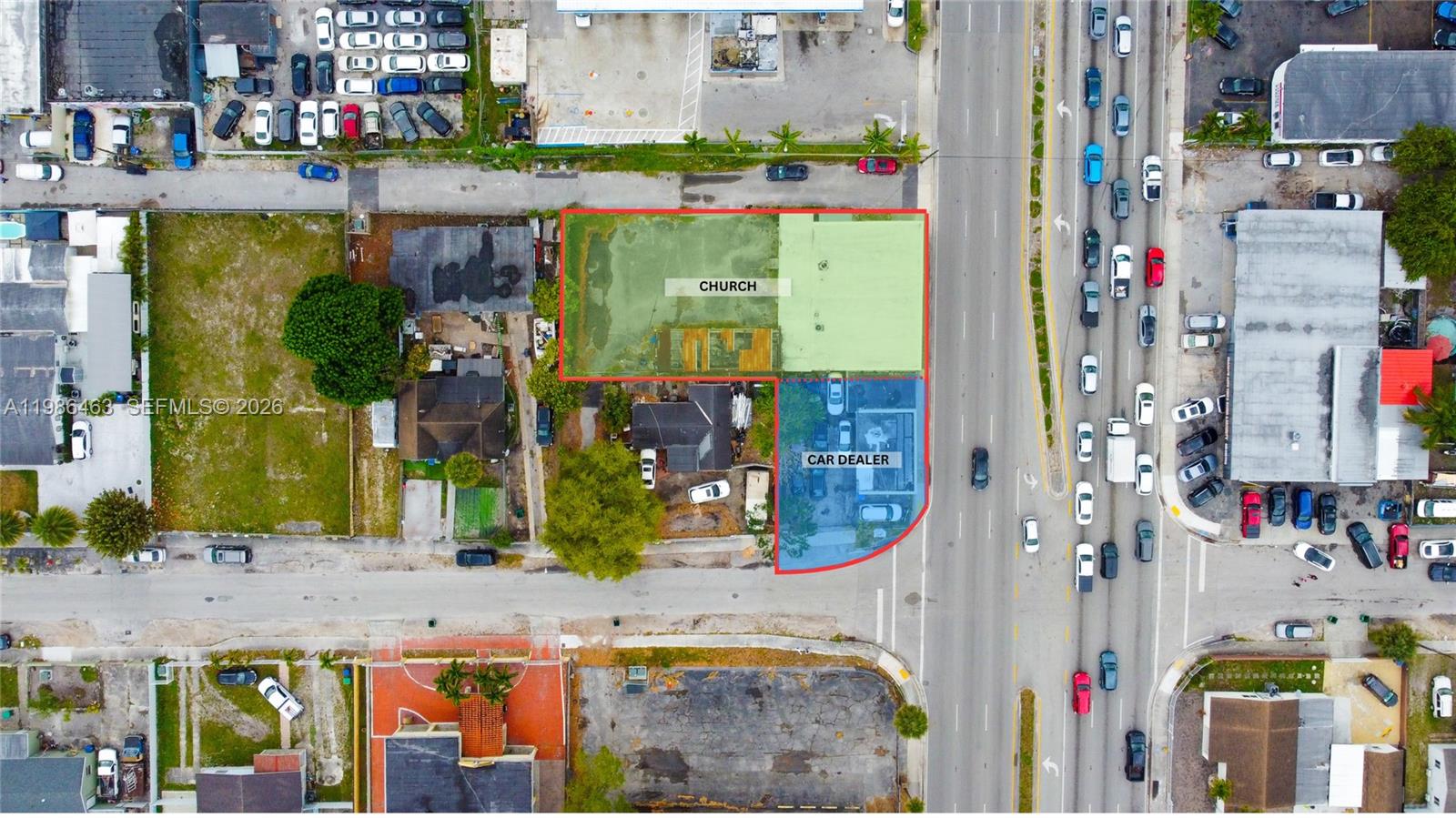 An aerial view shows a commercial building with a fenced parking lot and surrounding streets — 2618 NW 103rd St, Miami FL 33147, MIAMI, FL