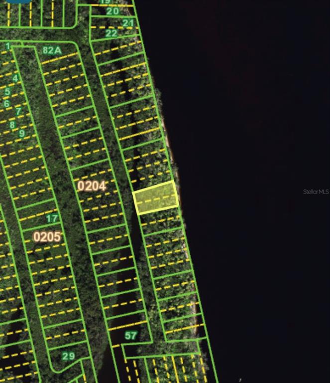 This is an aerial map showing a highlighted waterfront lot within a residential subdivision — 1198 MALABO COURT, PUNTA GORDA, FL