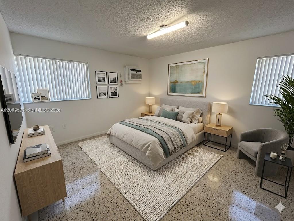 A bedroom features a bed, two nightstands, a dresser, an armchair, and terrazzo flooring — 142 SW 18th Ave # 20, Miami FL 33135, MIAMI, FL