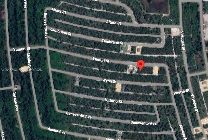 This is an aerial map showing a residential area with streets and a red location marker — 7711 Yumuri St, Sebring FL 33872, SEBRING, FL