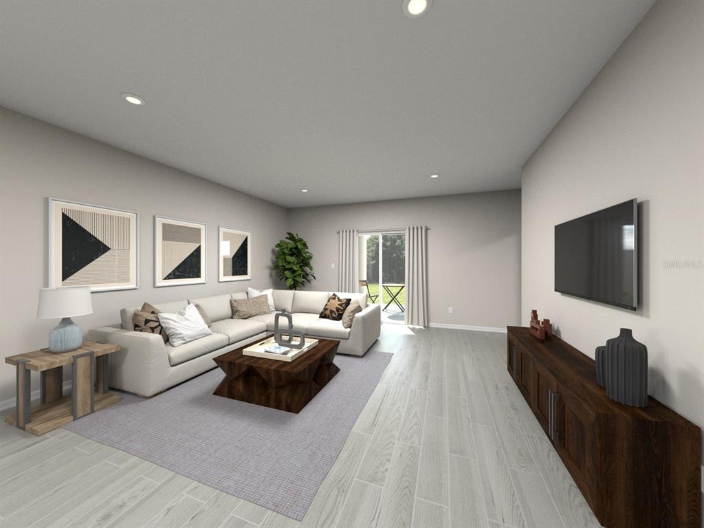 This is a digital rendering of a living room with a sectional sofa and television — 108 GENTLE RAIN LANE, NOKOMIS, FL