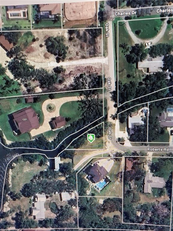 This is an aerial map showing a vacant lot located at the intersection of two roads — OAK STREET, NOKOMIS, FL