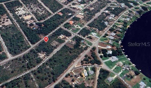 This is an aerial map view of a residential area with streets and a lake — 978 ARCHIE SUMMERS ROAD, LAKE PLACID, FL