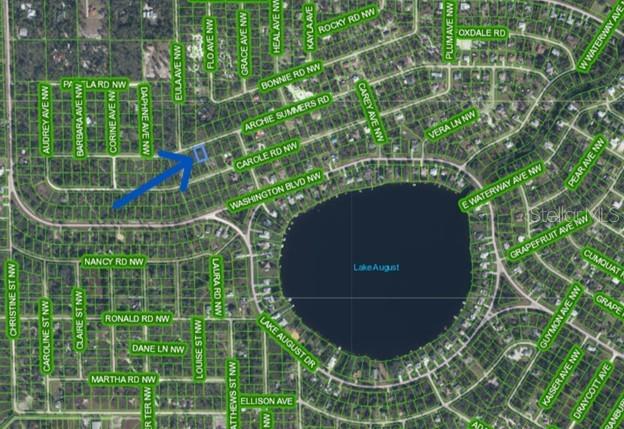 This is a satellite map showing a highlighted residential lot near Lake August — 978 ARCHIE SUMMERS ROAD, LAKE PLACID, FL