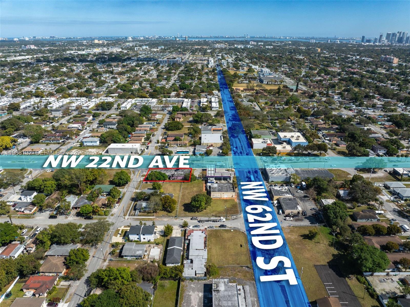 An aerial view shows a vacant lot outlined in red at a street intersection — 6210 NW 22nd Ave, Miami FL 33147, MIAMI, FL