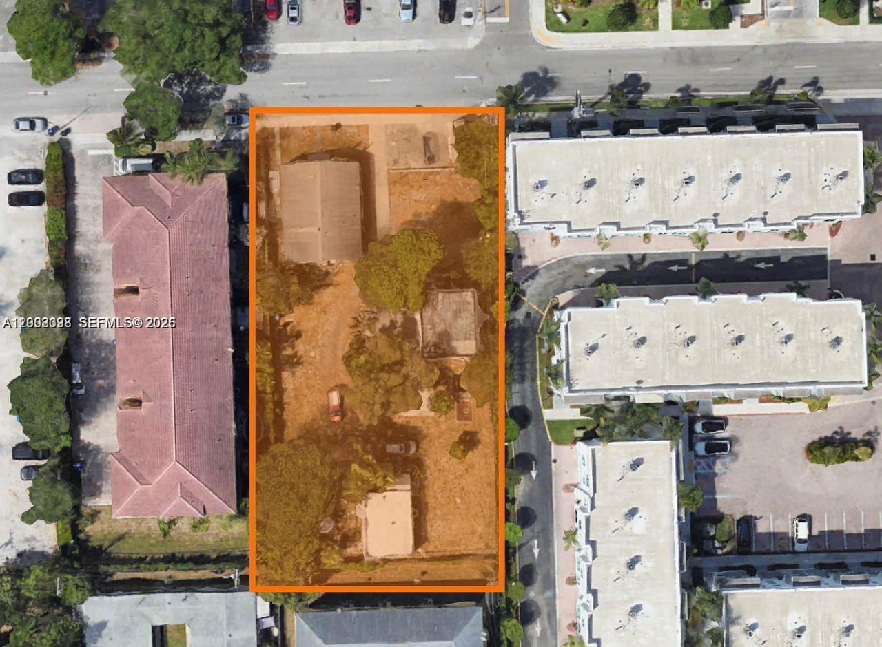 An aerial view shows a rectangular lot with two small buildings and trees — 2202 Van Buren St, Hollywood FL 33020, HOLLYWOOD, FL