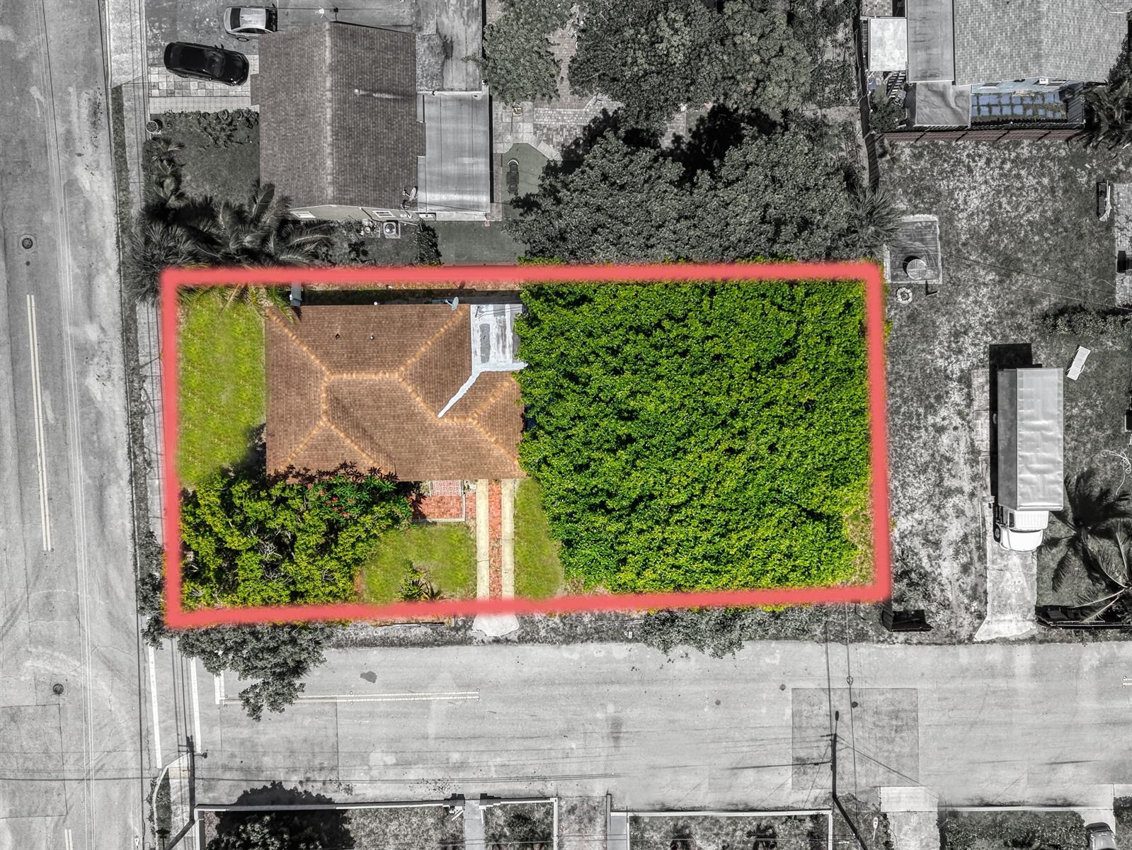 An aerial view shows a house with a brown roof and a large tree-covered yard — 5409 Western Avenue, West Palm Beach FL 33405, WEST PALM BEACH, FL