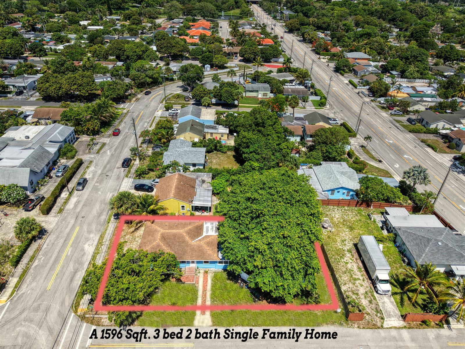 An aerial view shows a single-family home with a large tree on a corner lot — 5409 Western Avenue, West Palm Beach FL 33405, WEST PALM BEACH, FL
